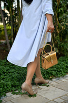 Golden Round Handle Sling Bag